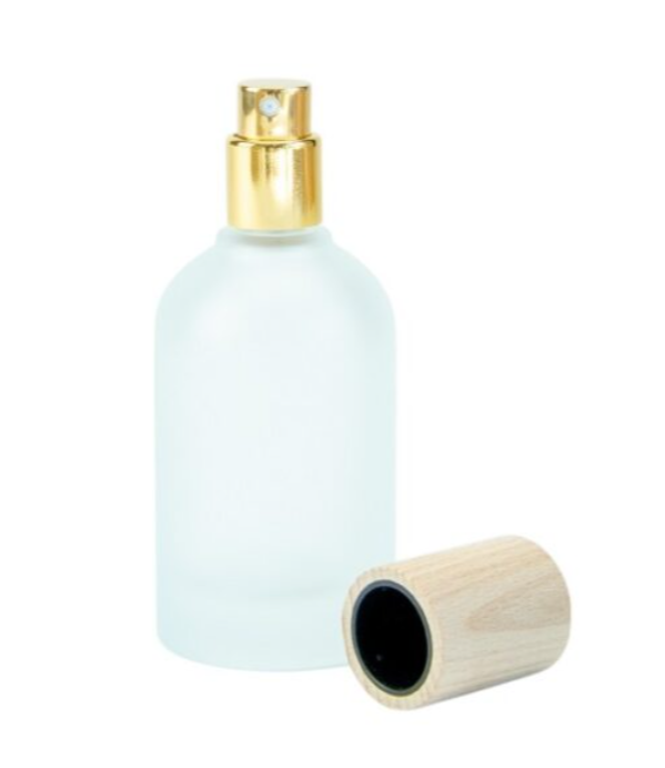 Glazen roomsprayflesje met houten dop