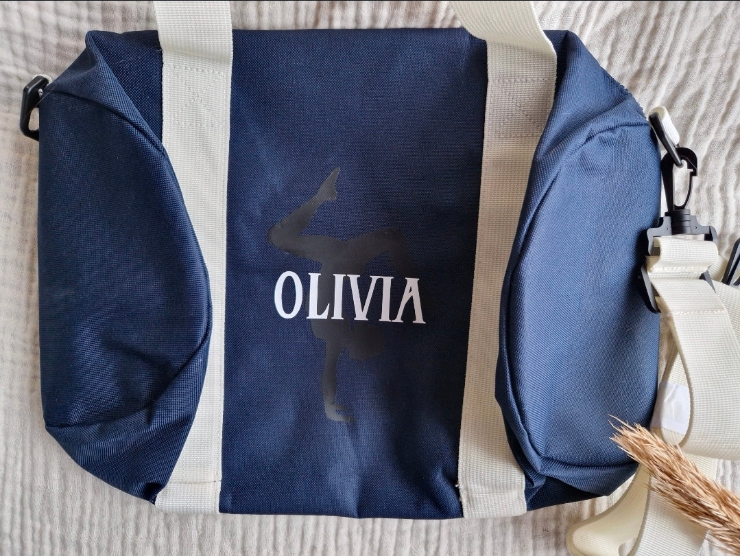navy blauwe sporttas met naam en turnsilhoutte